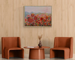 Load image into Gallery viewer, Landscape of colourful tulips in  room setting with two rust chairs and coffee table
