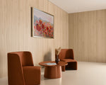 Load image into Gallery viewer, Landscape of colourful tulips showing side view of painting  in  room setting with two rust chairs and coffee table
