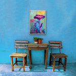 Load image into Gallery viewer, Dazzling jewel tones sparkle this abstract flower artwork with playfulness and laughter in this original large format painting. Richly textured painting features bold blues, purples, greens, and yellows displayed on a blue wall with funky antique furniture.
