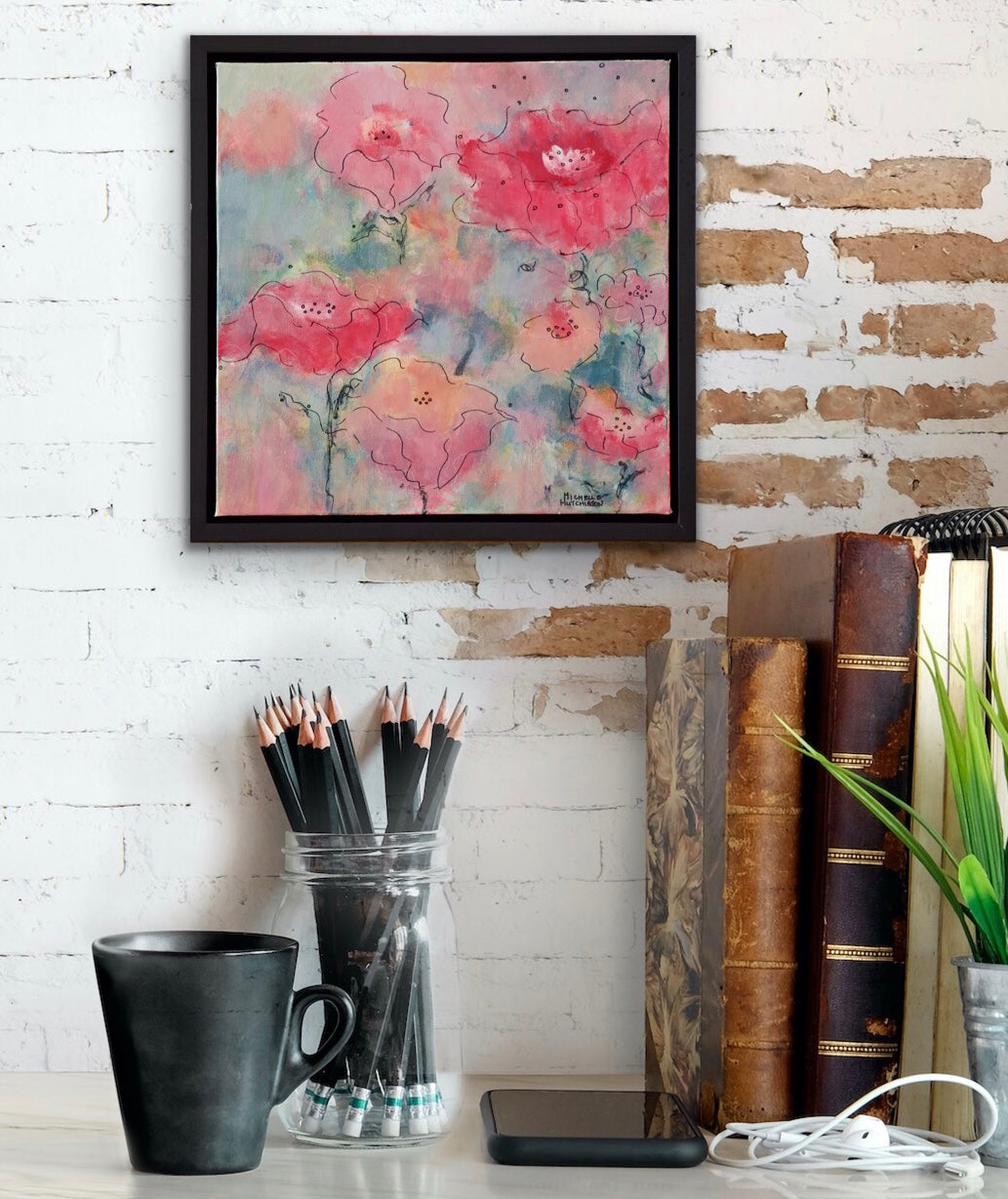 Displayed on a white brick wall above a desk. Abstract flowers in reds, pinks, and corals against a background of blue greens is bursting with colourful personality in this original painting! 