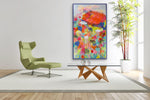 Load image into Gallery viewer, Painting shown beside a chartreuse/sage green chair above a coffee table.
