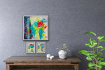 Load image into Gallery viewer, Offbeat and playful, this joyful original painting uses a technique called acrylic pouring. The red flowers sit within a teal vase beside blue drapes, inviting the viewer to gaze into the heart of love. It has a glossy finish. Displayed on a grey wall with two mini paintings above a console table.
