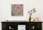 Load image into Gallery viewer, Delightfully fun and abstract, orange fantasy flowers float up. Displayed above a piano.
