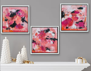 Three small paintings above a mantel