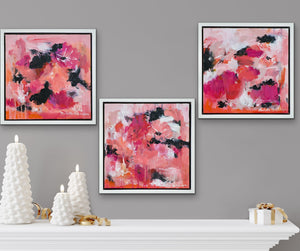 Three small paintings above a mantel