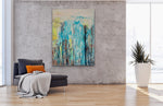 Load image into Gallery viewer, Waterfall shown against a concrete wall with a grey lounger with a burnt orange pillow
